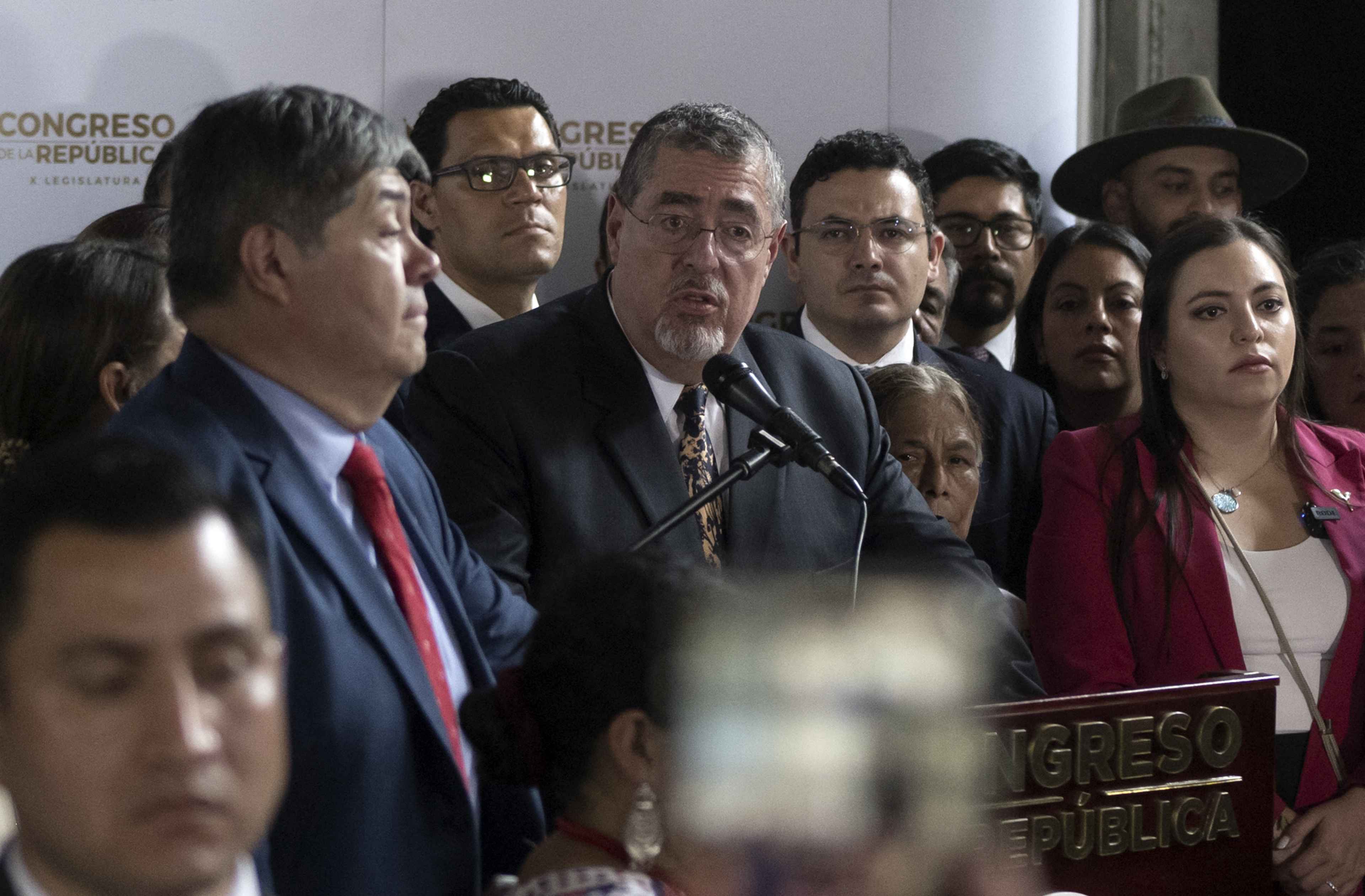 Guatemalan President Bernardo Arévalo (center) holds a press conference presenting legal reforms to Congress that would allow new grounds for removal of the country's top prosecutor, in Guatemala City on May 6, 2024. Photo Edwin Bercián/AFP