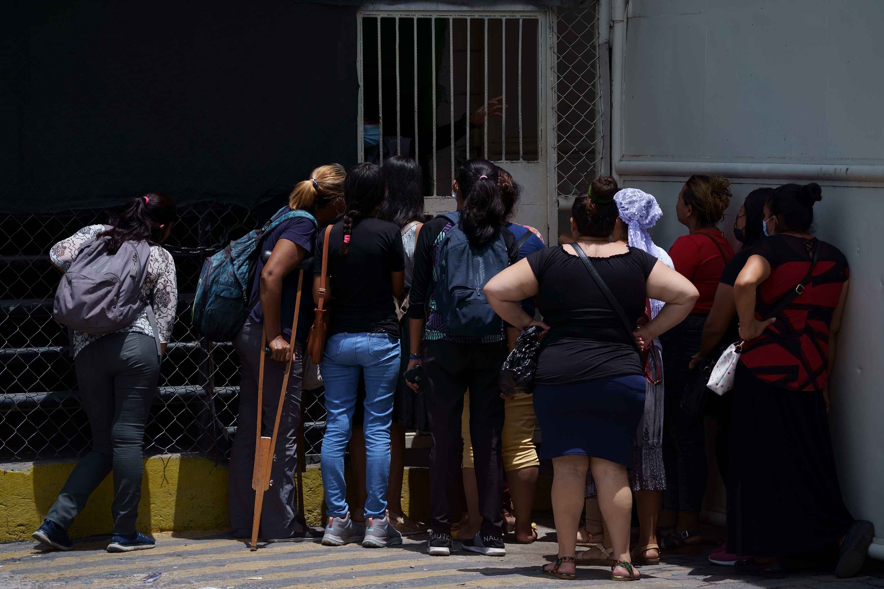 Women seek information about their detained relatives in front of Mariona Prison amid mass arrests and the lack of information about cases. Photo Víctor Peña